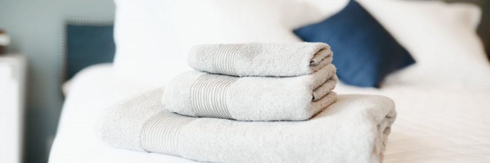 Is It OK to Wash Towels and Bed Sheets Together?